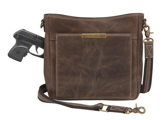 Gun Tote'n Mamas Distressed Leather Slim X-Body Purse in Brown has a brass plate accent